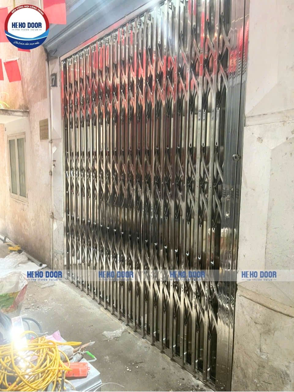 cua-xep-inox-cho-nha-pho